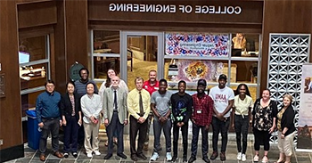 ECE Department Hosts Edge AI Summer Program attendees and faculty take a group picture in the Shelby Hall atrium.